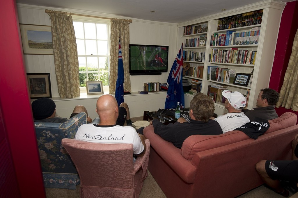Emirates Team New Zealand sailors and shore crew watch the All Blacks vs Tonga Rugby World Cup game on TV before a day of practice for the America's Cup World Series in Plymouth, England. 9 /9/2011 photo copyright Chris Cameron/ETNZ http://www.chriscameron.co.nz taken at  and featuring the  class