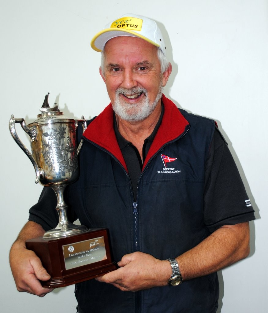 Derwent Sailing Squadron Commodore Ron Bugg with the line honours trophy for the race, a re-dedicated trophy first awarded in 1889 - Launceston to Hobart Race photo copyright  Andrea Francolini Photography http://www.afrancolini.com/ taken at  and featuring the  class