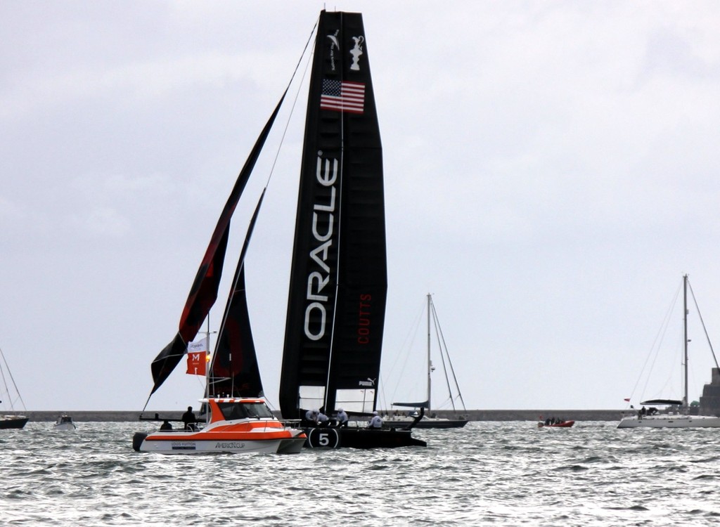 Oracle Racing finishes - America&rsquo;s Cup World Series - Day 7, 18 September 2011 photo copyright Ben Gladwell http://www.sail-world.com/nz taken at  and featuring the  class