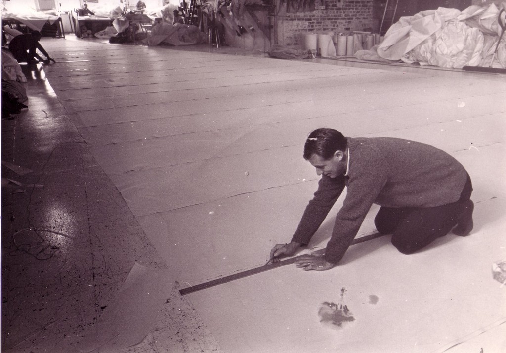 Tony Bouzaid at work on the sail loft floor © Bouzaid Family Collection