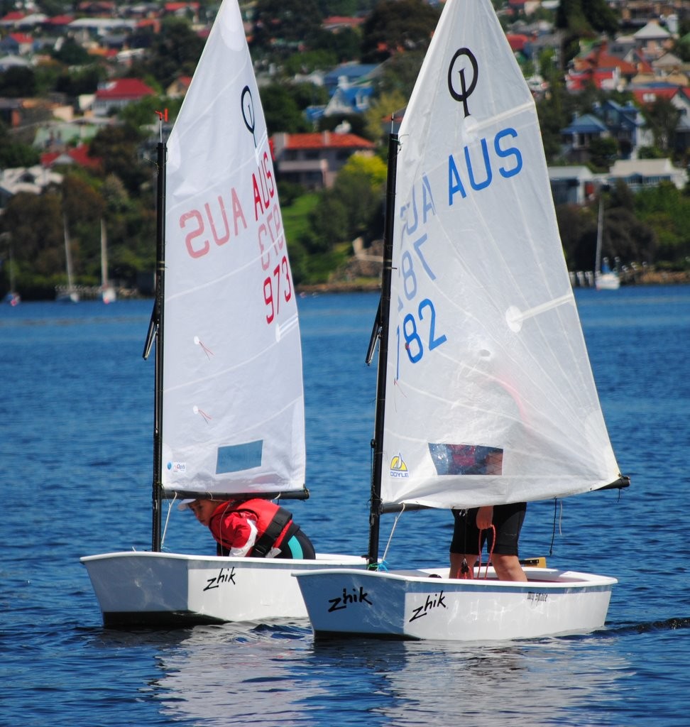 Optimistic Optimists sailors waiting for the breeze - The Showdown 2011 photo copyright Rob Cruse taken at  and featuring the  class