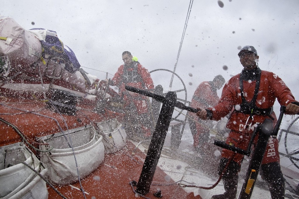 Roberto Bermudez de Castro and crew weathers the storm onboard CAMPER with Emirates Team New Zealand during leg 1 of the Volvo Ocean Race 2011-12 photo copyright Hamish Hooper/Camper ETNZ/Volvo Ocean Race taken at  and featuring the  class