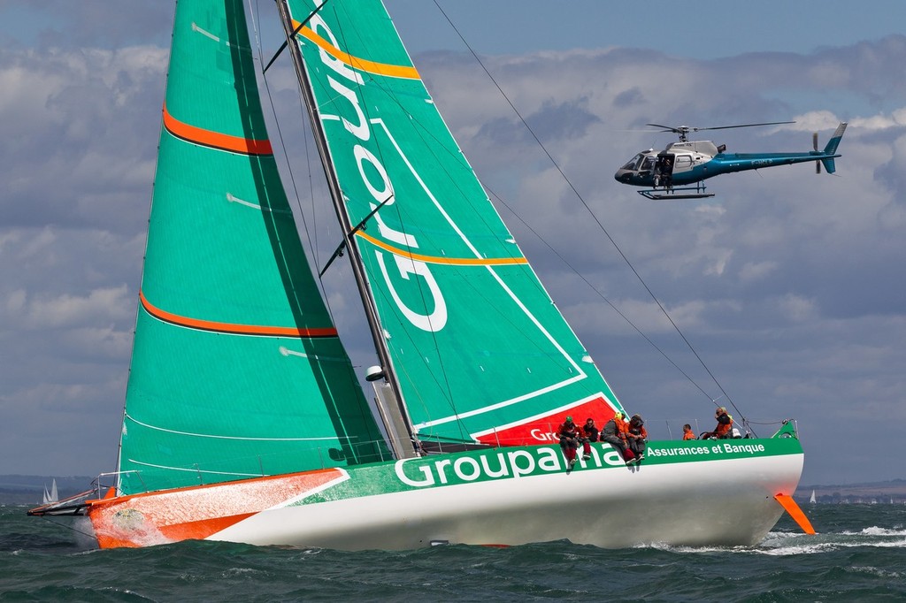 UK, Solent. 14th August 2011. Groupama Sailing Team skippered by Franck Cammas from France at the start of the Rolex Fastnet Race. photo copyright Ian Roman/Volvo Ocean Race http://www.volvooceanrace.com taken at  and featuring the  class