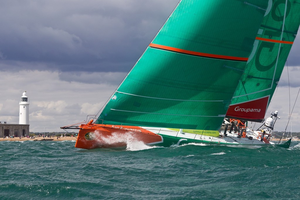 UK, Solent. 14th August 2011. Groupama Sailing Team skippered by Franck Cammas from France approaching Hurst lighthouse at the start of the Rolex Fastnet Race. -  - Volvo Ocean Race - Rolex Fastent Race photo copyright Volvo Ocean Race http://www.volvooceanrace.com taken at  and featuring the  class