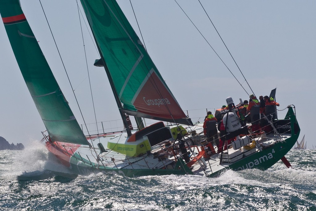 UK, Solent. 14th August 2011. Groupama Sailing Team skippered by Franck Cammas from France approaching The Needles at the start of the Rolex Fastnet Race. photo copyright Ian Roman/Volvo Ocean Race http://www.volvooceanrace.com taken at  and featuring the  class