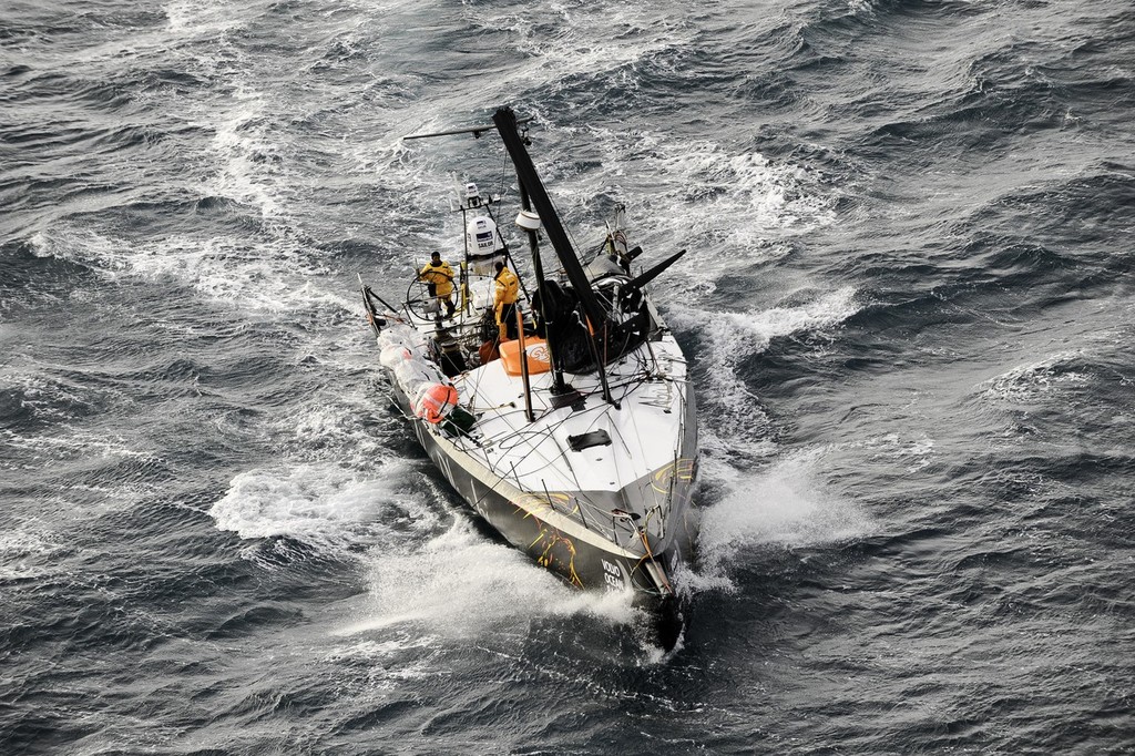 Abu Dhabi Ocean Racing’s yacht Azzam, skippered by Britain’s Ian Walker, returns to Alicante, Spain after the mast broke in rough weather on the first day of racing on leg 1 of the Volvo Ocean Race 2011-12.  © Paul Todd/Volvo Ocean Race http://www.volvooceanrace.com