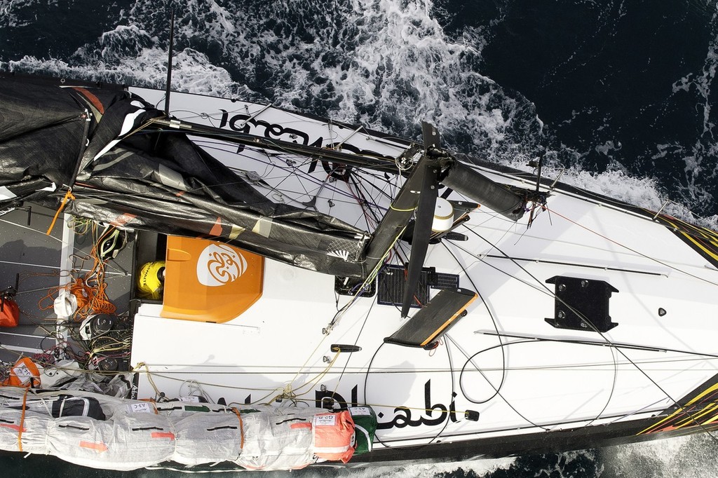 Abu Dhabi Ocean Racing’s yacht Azzam, skippered by Britain’s Ian Walker, returns to Alicante, Spain after the mast broke in rough weather on the first day of racing on leg 1 of the Volvo Ocean Race 2011-12. ( © Paul Todd/Volvo Ocean Race http://www.volvooceanrace.com