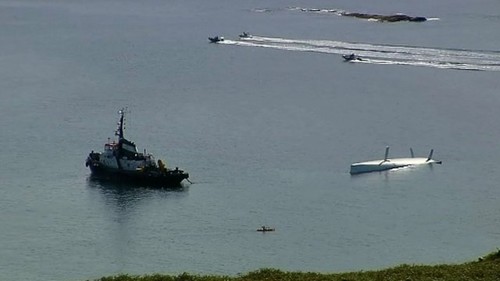 Rambler 100 being righted righted in Barley Cove bay, Co Cork © SW