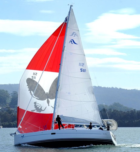 Granny Jen under sail on Brisbane Water, with her new spinnaker, complete with butterfly logo, the logo of the Lupus Association, of which Jeanette Rowe was president for a number of years. © Mark Scott
