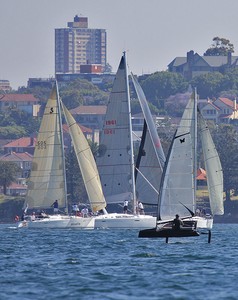 Ferries and ships were not the only thing to carve through the fleet - Foiling Moths came out to play, as well. - John Curnow photo copyright  John Curnow taken at  and featuring the  class