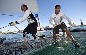 Anton Paz and Tom Buggy working hard on Team Extreme in the light airs - Extreme Sailing Series 2011 Act 8 photo copyright Lloyd Images http://lloydimagesgallery.photoshelter.com/ taken at  and featuring the  class