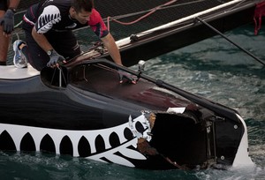 Emirates Team New Zealand received damage to her port transom during race 23

 - Extreme Sailing Series Act 8 2011 photo copyright Lloyd Images http://lloydimagesgallery.photoshelter.com/ taken at  and featuring the  class