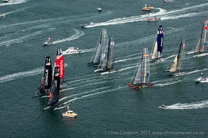The fleet rounding the first mark of the second race of day five of the America's Cup World Series in Cascais, Portugal. 12/8/2011 photo copyright Chris Cameron/ETNZ http://www.chriscameron.co.nz taken at  and featuring the  class