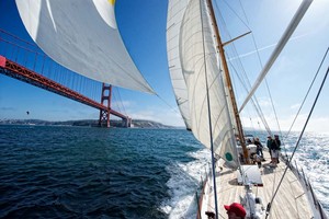 1929 M class sloop Pursuit sailing under the golden gate bridge in San Francisco on a Sunday race in mid September. Ron has owned the boat since 1961 and this is only the second time the spinnaker has been up since the 1969 Transpac.    Photo credit to read WWW.OUTSIDEIMAGES.COM or a 50 Euro fee is charged photo copyright Tom Zinn/www.OutsideImages.com http://www.outsideimages.com taken at  and featuring the  class