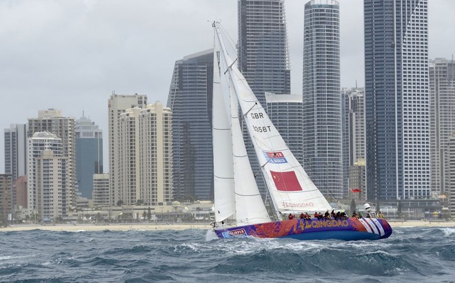 Qingdao races past Surfers Paradise at the start of the race from the Gold Coast to Singapore in the Clipper 11-12 Round the World Yacht Race. © Steve Holland/onEdition