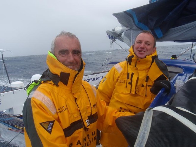 Loick Peyron (left) aboard Banque Populaire sailing through the southern Indian Ocean © Team Banque Populaire http://www.voile.banquepopulaire.fr/