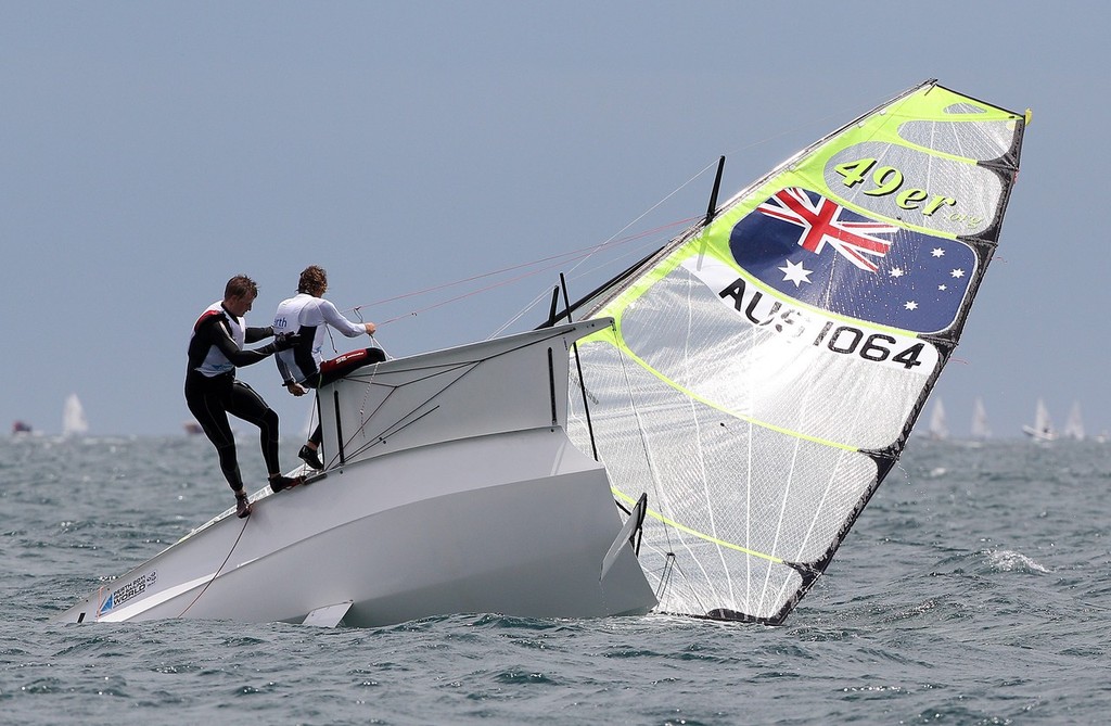 Daniel Roberts and Andrew Gillies of Australia attempt to re-right their boat - 49er Men&rsquo;s Skiff Class - Perth 2011 ISAF Sailing World Championships photo copyright Paul Kane /Perth 2011 http://www.perth2011.com taken at  and featuring the  class
