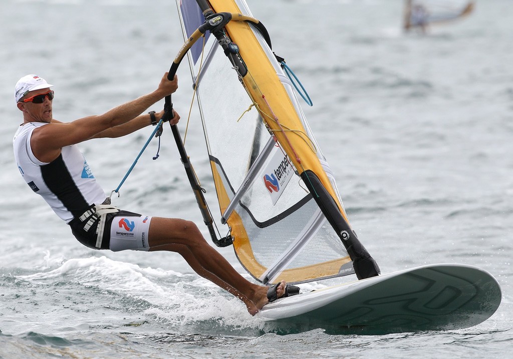 PERTH, AUSTRALIA - DECEMBER 13: Tom Ashley of New Zealand competes on day 11 during the RS:X Men's Windsurfer event of the 2011 ISAF Sailing World Championships on December 13, 2011 in Perth, Australia. (Photo by Paul Kane/Perth 2011) photo copyright Paul Kane /Perth 2011 http://www.perth2011.com taken at  and featuring the  class