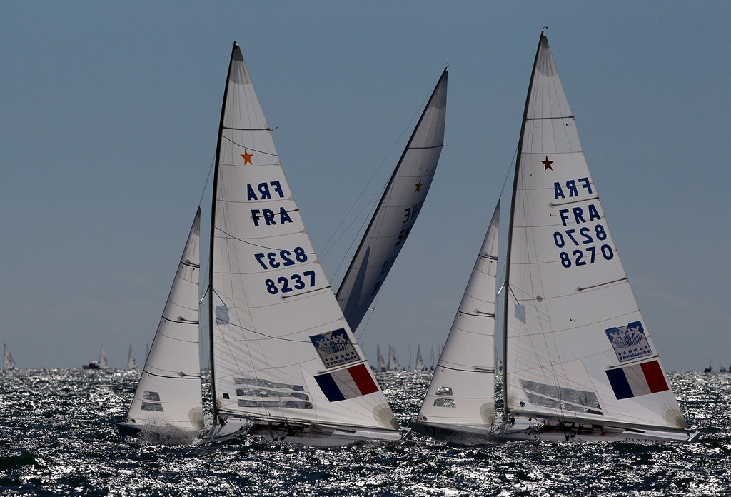 PERTH, AUSTRALIA - DECEMBER 17:  Xavier Rohart and Pierre Ponsot of France compete for position with Guillaume Florent and Pascal Rambeau of France on day 15 during the Star Men's Keel Boat Medal Race of the 2011 ISAF Sailing World Championships on December 17, 2011 in Perth, Australia. (Photo by Paul Kane/Perth 2011) photo copyright Paul Kane /Perth 2011 http://www.perth2011.com taken at  and featuring the  class