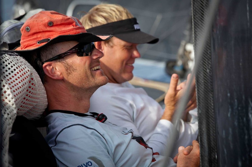 ``Aussies`` Tom Addis (red hat) and Casey Smith share a laugh on the foredeck. PUMA Ocean Racing powered by BERG during leg 2 of the Volvo Ocean Race 2011-12, from Cape Town, South Africa to Abu Dhabi, UAE. (Credit: Amory Ross/PUMA Ocean Racing/Volvo Ocean Race) photo copyright Amory Ross/Puma Ocean Racing/Volvo Ocean Race http://www.puma.com/sailing taken at  and featuring the  class