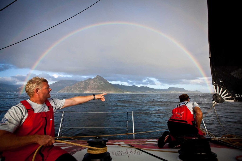 Tony Mutter and Jono Swain looking for wind under a rainbow-producing cloud. PUMA Ocean Racing powered by BERG during leg 2 of the Volvo Ocean Race 2011-12, from Cape Town, South Africa to Abu Dhabi, UAE. (Credit: Amory Ross/PUMA Ocean Racing/Volvo Ocean Race) photo copyright Amory Ross/Puma Ocean Racing/Volvo Ocean Race http://www.puma.com/sailing taken at  and featuring the  class