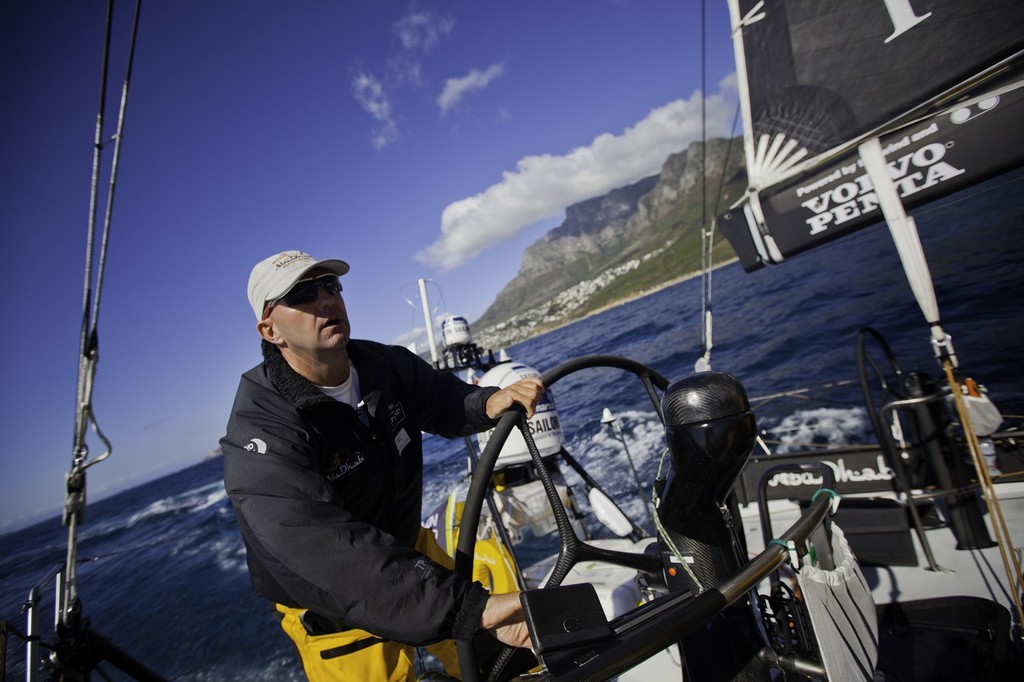 Ian Walker helming onboard Abu Dhabi Ocean Racing during leg 2 of the Volvo Ocean Race 2011-12, from Cape Town, South Africa to Abu Dhabi, UAE. (Credit: Nick Dana/Abu Dhabi Ocean Racing/Volvo Ocean Race) photo copyright Nick Dana/Abu Dhabi Ocean Racing /Volvo Ocean Race http://www.volvooceanrace.org taken at  and featuring the  class