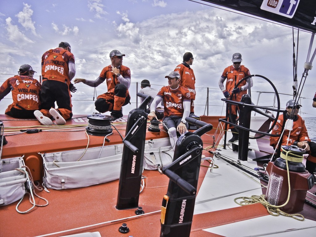 The crew of CAMPER with Emirates Team New Zealand all on deck awaiting a tack during leg 2 of the Volvo Ocean Race 2011-12, from Cape Town, South Africa to Abu Dhabi, UAE. (Credit: Hamish Hooper/CAMPER ETNZ/Volvo Ocean Race) photo copyright Hamish Hooper/Camper ETNZ/Volvo Ocean Race taken at  and featuring the  class