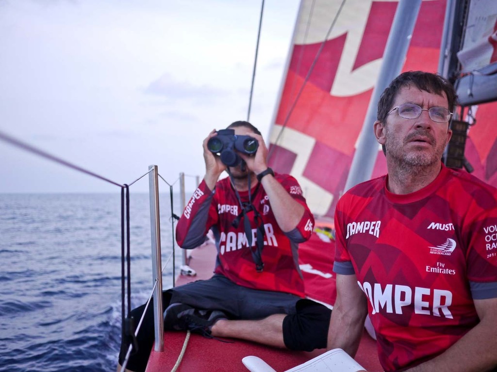 Navigators Will Oxley and Andy McLean keeping a close eye on Telefonica from onboard CAMPER with Emirates Team New Zealand during leg 2 of the Volvo Ocean Race 2011-12, from Cape Town, South Africa to Abu Dhabi, UAE. (Credit: Hamish Hooper/CAMPER ETNZ/Volvo Ocean Race) photo copyright Hamish Hooper/Camper ETNZ/Volvo Ocean Race taken at  and featuring the  class