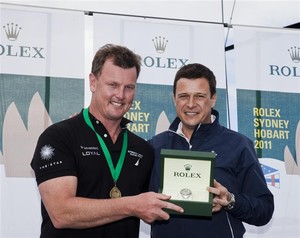 Anthony Bell, owner of INVESTEC LOYAL and Patrick Boutellier, Rolex Australia - Rolex Sydney Hobart 2011 photo copyright  Rolex/Daniel Forster http://www.regattanews.com taken at  and featuring the  class