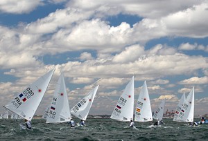 PERTH, AUSTRALIA - DECEMBER 14:  Competitors sail to the second mark on day 12 during the Laser - Men's One Person Dinghy event of the 2011 ISAF Sailing World Championships on December 14, 2011 in Perth, Australia. (Photo by Paul Kane/Perth 2011) photo copyright Paul Kane /Perth 2011 http://www.perth2011.com taken at  and featuring the  class