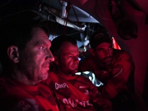 3 wise men, Will Oxley, Chris Nicholson & Stuart Bannatyne ponder the best navigational options onboard CAMPER with Emirates Team New Zealand during leg 1 of the Volvo Ocean Race 2011-12, from Alicante, Spain to Cape Town, South Africa. photo copyright Hamish Hooper/Camper ETNZ/Volvo Ocean Race taken at  and featuring the  class