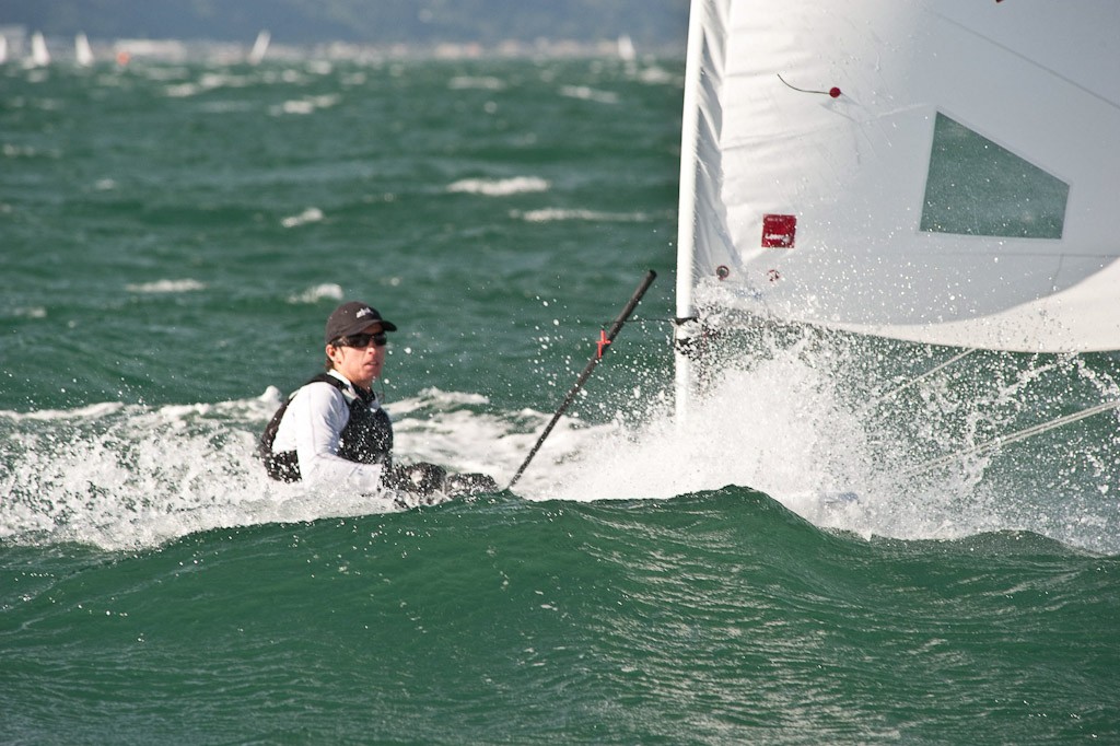 A competitor negotiates their way through the building sea state on day one of the 2012 Laser National Championships (Chris Coad Photography) - 2012 New Zealand National Championships photo copyright Chris Coad Photography http://www.chriscoad.co.nz/ taken at  and featuring the  class