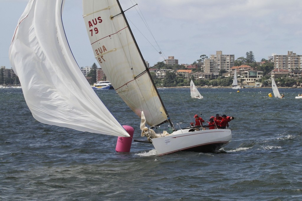 Flying Brandy Gybing over the finish line  - Sydney Harbour Regatta 2012 © Beth Morley - Sport Sailing Photography http://www.sportsailingphotography.com