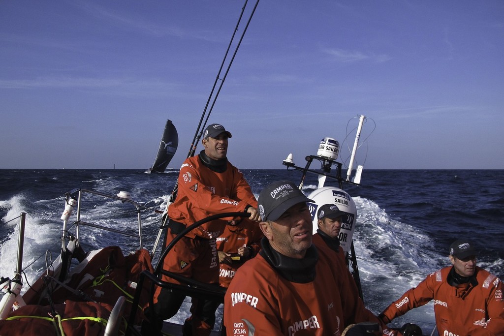 Stu Bannatyne on the helm with Puma in close pursuit onboard CAMPER with Emirates Team New Zealand during leg 2 of the Volvo Ocean Race 2011-12, from Cape Town, South Africa to Abu Dhabi, UAE. (Credit: Hamish Hooper/CAMPER ETNZ/Volvo Ocean Race) photo copyright Emirates Team New Zealand http://www.etnzblog.com taken at  and featuring the  class