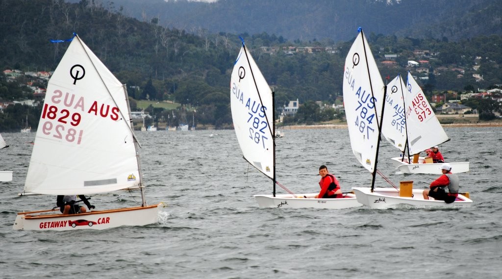 Joshua Harris (sail number 1829) from the Tamar Yacht Club leads a group of Sandy Bay sailors around the leeward mark in the Optimists State champions, including Alexander Potter (782), Damien Messmer (784) and Lily Zeeman (973) - Optimist Tasmanian championships 2012 photo copyright Rob Cruse taken at  and featuring the  class