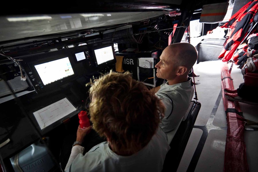 Tom Addis and Ken Read mull over the new weather information in hopes of finding a way out of the northwest predicaments to come. PUMA Ocean Racing powered by BERG during leg 4 of the Volvo Ocean Race 2011-12, from Sanya, China to Auckland, New Zealand. (Credit: Amory Ross/PUMA Ocean Racing/Volvo Ocean Race) photo copyright Amory Ross/Puma Ocean Racing/Volvo Ocean Race http://www.puma.com/sailing taken at  and featuring the  class