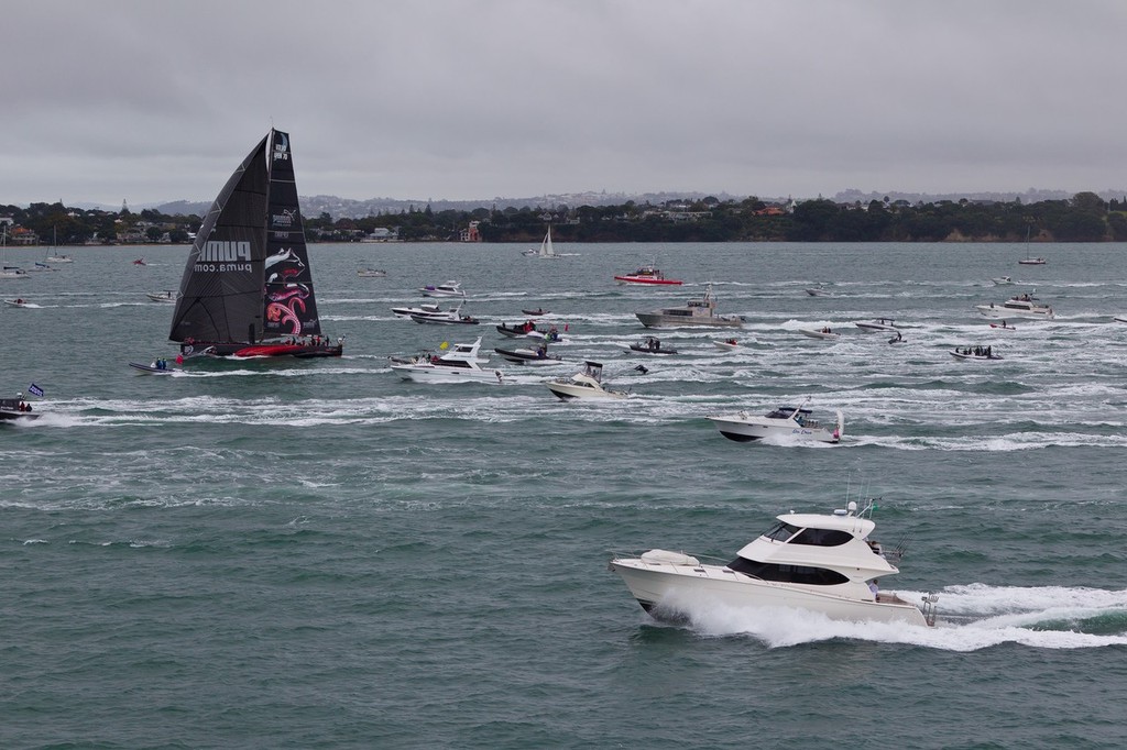 PUMA Ocean Racing powered by BERG, skippered by Ken Read from the USA is followed by spectator boats as they take second place on leg 4 in Auckland, during the Volvo Ocean Race 2011-12. (Credit: IAN ROMAN/Volvo Ocean Race) photo copyright Ian Roman/Volvo Ocean Race http://www.volvooceanrace.com taken at  and featuring the  class