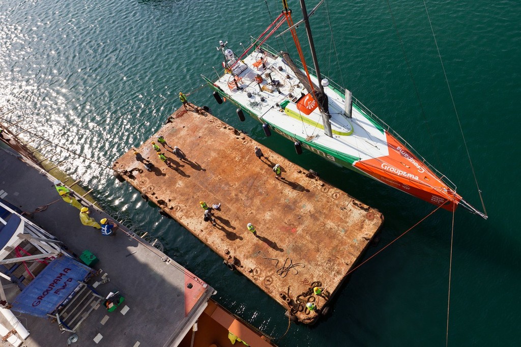 Groupama Sailing Team is unloaded ready for the restart of stage 2 of leg 2 to Abu Dhabi. (Photo Credit must read: IAN ROMAN/Volvo Ocean Race) photo copyright Ian Roman/Volvo Ocean Race http://www.volvooceanrace.com taken at  and featuring the  class