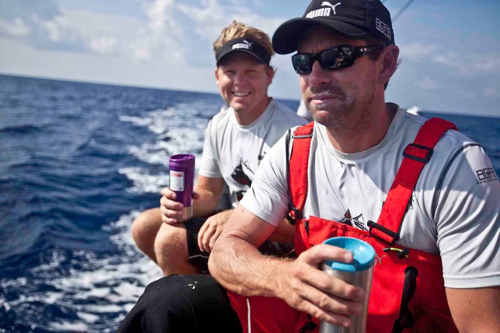 Watch partners Casey Smith and Brad Jackson share a coffee on the rail. PUMA Ocean Racing powered by BERG during leg 3 of the Volvo Ocean Race 2011-12, from Abu Dhabi, UAE to Sanya, China. (Credit: Amory Ross/PUMA Ocean Racing/Volvo Ocean Race) photo copyright Amory Ross/Puma Ocean Racing/Volvo Ocean Race http://www.puma.com/sailing taken at  and featuring the  class