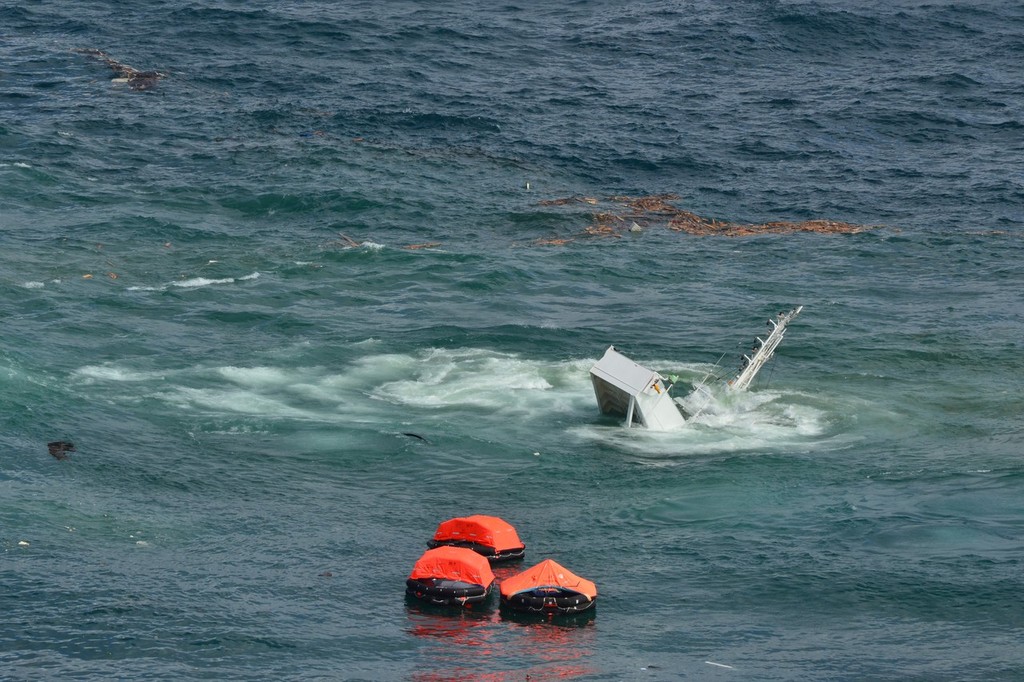 Rena stern section sinking from overflight on 10 January 2012 at 1030hrs photo copyright Maritime NZ www.maritimenz.govt.nz taken at  and featuring the  class