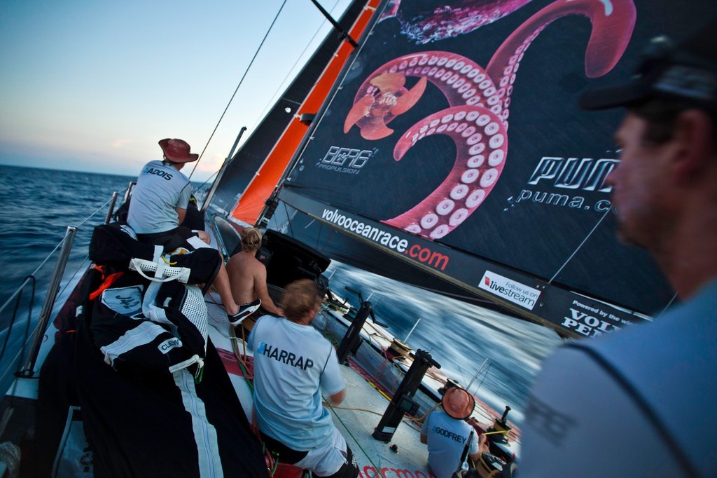 Brad Jackson pilots the Mar Mostro towards landfall at the Solomon Islands near sunset. Puma Ocean Racing  during leg 4 of the Volvo Ocean Race 2011-12, from Sanya, China to Auckland, New Zealand.  © Amory Ross/Puma Ocean Racing/Volvo Ocean Race http://www.puma.com/sailing