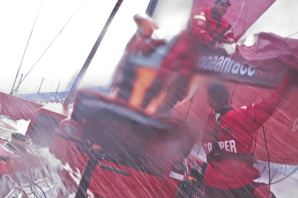 Mike Pammenter and Adam Minoprio putting in a reef onboard CAMPER with Emirates Team New Zealand during leg 4 of the Volvo Ocean Race 2011-12, from Sanya, China to Auckland, New Zealand. (Credit: Hamish Hooper/CAMPER ETNZ/Volvo Ocean Race) photo copyright Hamish Hooper/Camper ETNZ/Volvo Ocean Race taken at  and featuring the  class