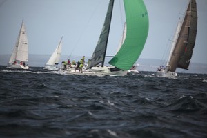 Jon Hanson's Wasabi storms through yachts still waiting to start. - Redink Homes Geographe Bay Race Week photo copyright Bernie Kaaks - copyright taken at  and featuring the  class