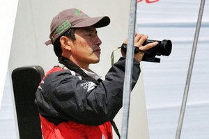 Media Crew Member Guo Chuan filming onboard Green Dragon - Volvo Ocean Race photo copyright  David Kneale/Volvo Ocean Race http://www.volvooceanrace.com/ taken at  and featuring the  class
