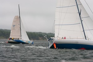 Derek Hatfield’s  Open 60 “Spirit of Canada” and “Bleu-Salin’eau” head out to sea at the start of Route Halifax Saint-Pierre 2010. photo copyright Derek Mason Photography taken at  and featuring the  class