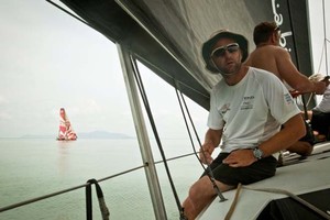 Skipper Ian Walker onboard Abu Dhabi Ocean Racing, chasing down CAMPER with Emirates Team New Zealand in the Strait of Malacca, during leg 3 of the Volvo Ocean Race 2011-12, from Abu Dhabi, UAE to Sanya, China. photo copyright Nick Dana/Abu Dhabi Ocean Racing /Volvo Ocean Race http://www.volvooceanrace.org taken at  and featuring the  class