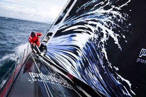 Michi Mueller goes to the bow for a jib change with New Zealand's Cape Reinga in the background. PUMA Ocean Racing powered by BERG during leg 4 of the Volvo Ocean Race 2011-12, from Sanya, China to Auckland, New Zealand. photo copyright Amory Ross/Puma Ocean Racing/Volvo Ocean Race http://www.puma.com/sailing taken at  and featuring the  class