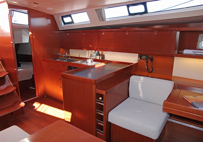 Modular nav station and galley occupy the port side of the main saloon. - Oceanis 45 ©  John Curnow
