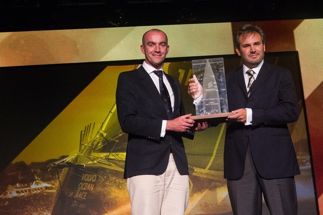 Traoloch Collins presents Juan Kouyoumdjian, with the Ercisson Designer Award for the Volvo Ocean Race 2011-12, at the Prize Giving Ceremony in Galway, Ireland, during the Volvo Ocean Race 2011-12. © Ian Roman/Volvo Ocean Race http://www.volvooceanrace.com