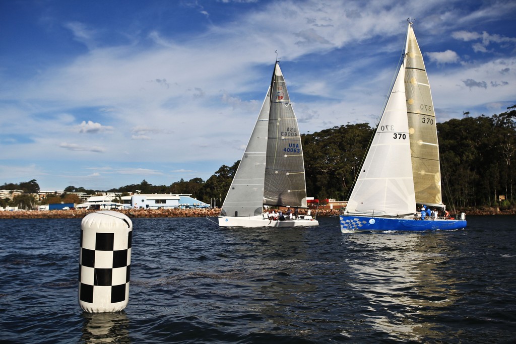 PT 73 (L) and She's the Culprit (R) cross the finish line in the Performance Racing Class during 2012 Sail Port Stephens Regatta hosted by Corlette Point Sailing Club Day 5. Picture by Matt King Sail Port Stephens Media Event photo copyright Matt King /Sail Port Stephens 2012 taken at  and featuring the  class